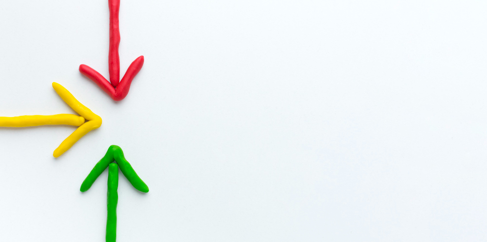 a plain background showing arrows of different colours to depict change